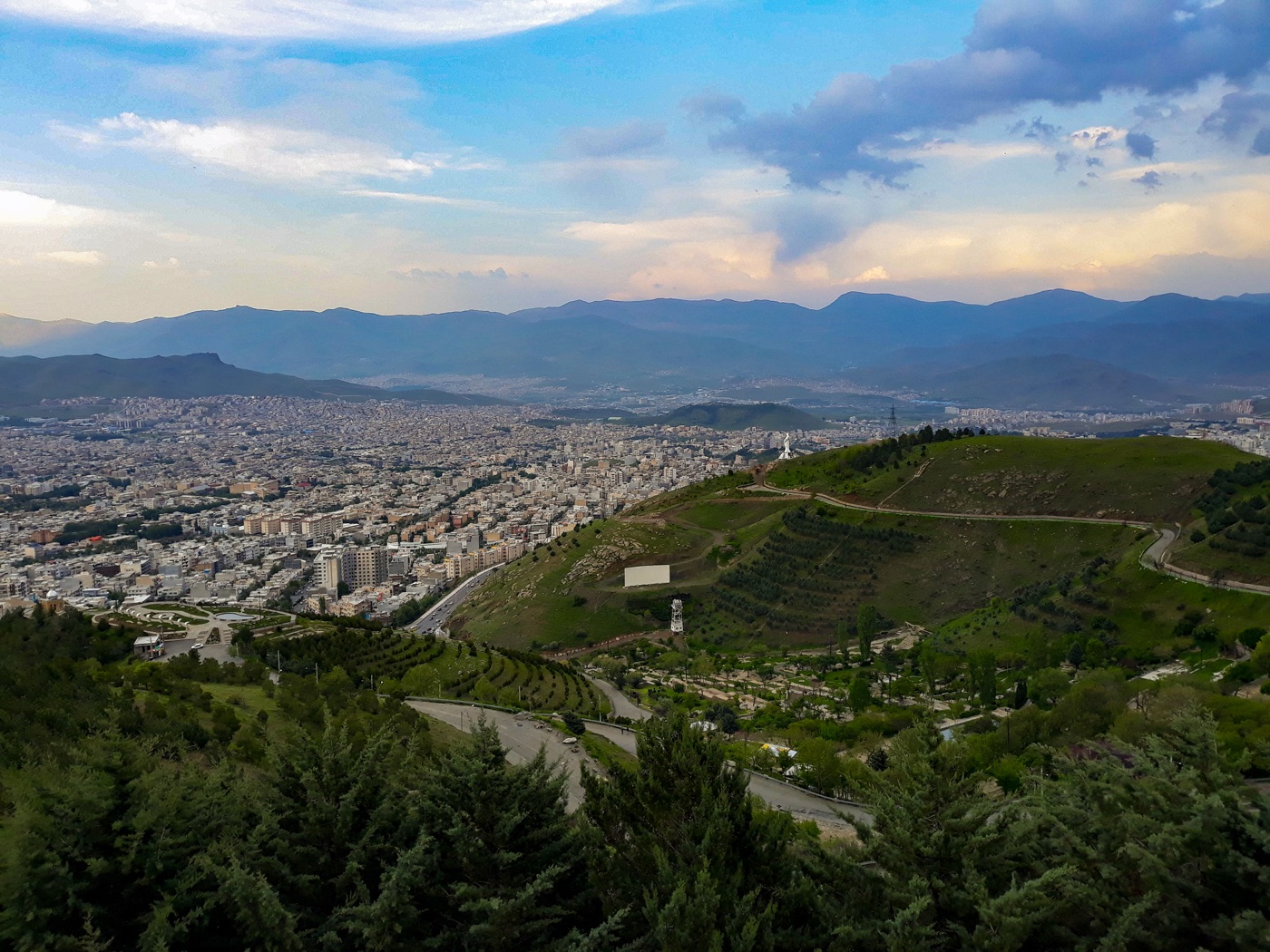 Green hillside paths and views over Sanandaj from Awyar